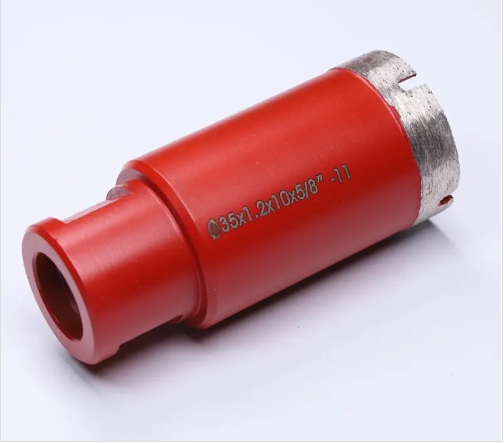 Red cylindrical drilling tool Red cylindrical drilling tool