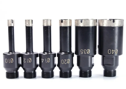 Black drill bits with metallic ends